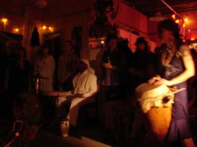 Voodoo druming fills the night.